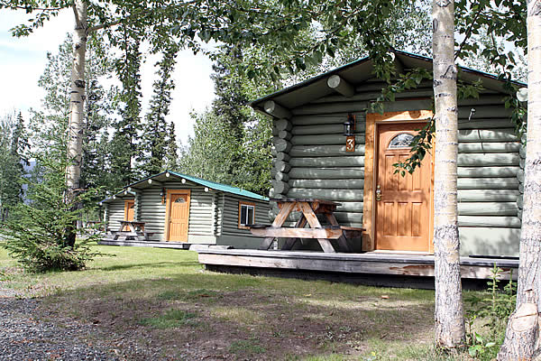 Discovery Yukon offers cozy cabins complete with bathrooms, showers and real comfy beds too.